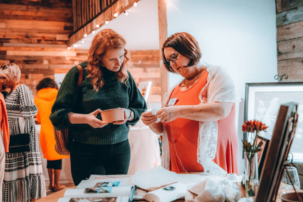 Rosie Bell, a Lace Maker from South Armagh shows her experience to a Tourism Northern Ireland Representative at the closing ceremony of the Atlantic CultureScape project in Mourne Gullion Strangford UNESCO Global Geopark